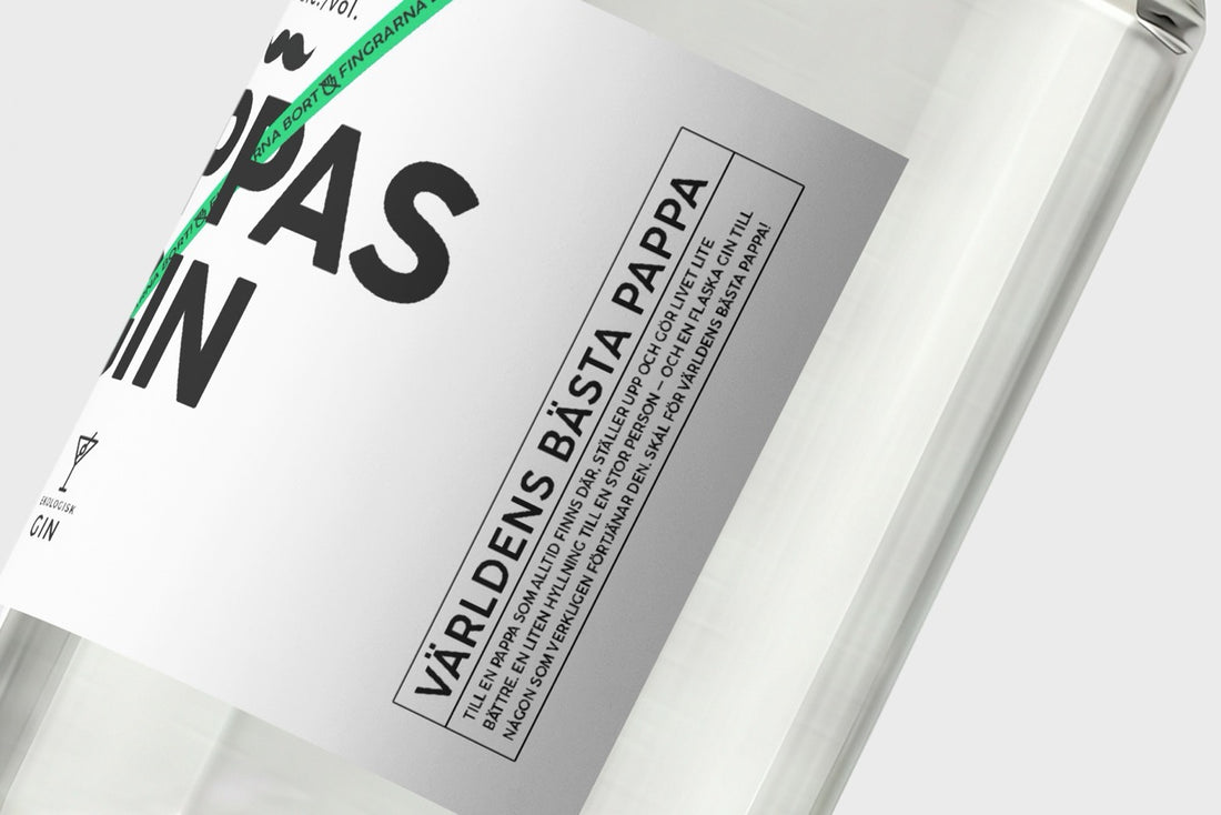 Närbild på etiketten på Pappas Gin – ekologisk premiumgin - Världens bästa pappa