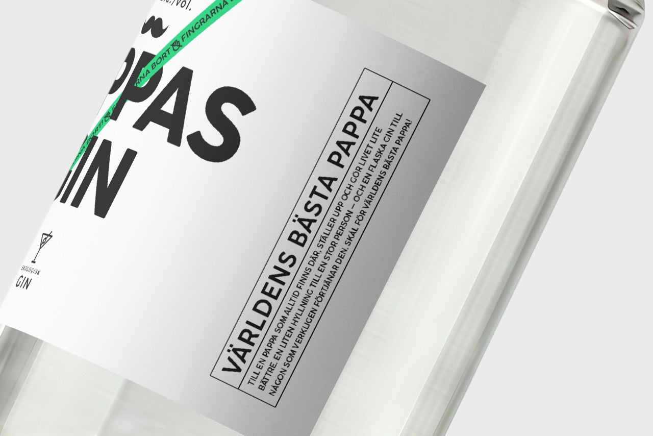 Närbild på etiketten på Pappas Gin – ekologisk premiumgin - Världens bästa pappa