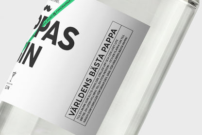 Närbild på etiketten på Pappas Gin – ekologisk premiumgin - Världens bästa pappa